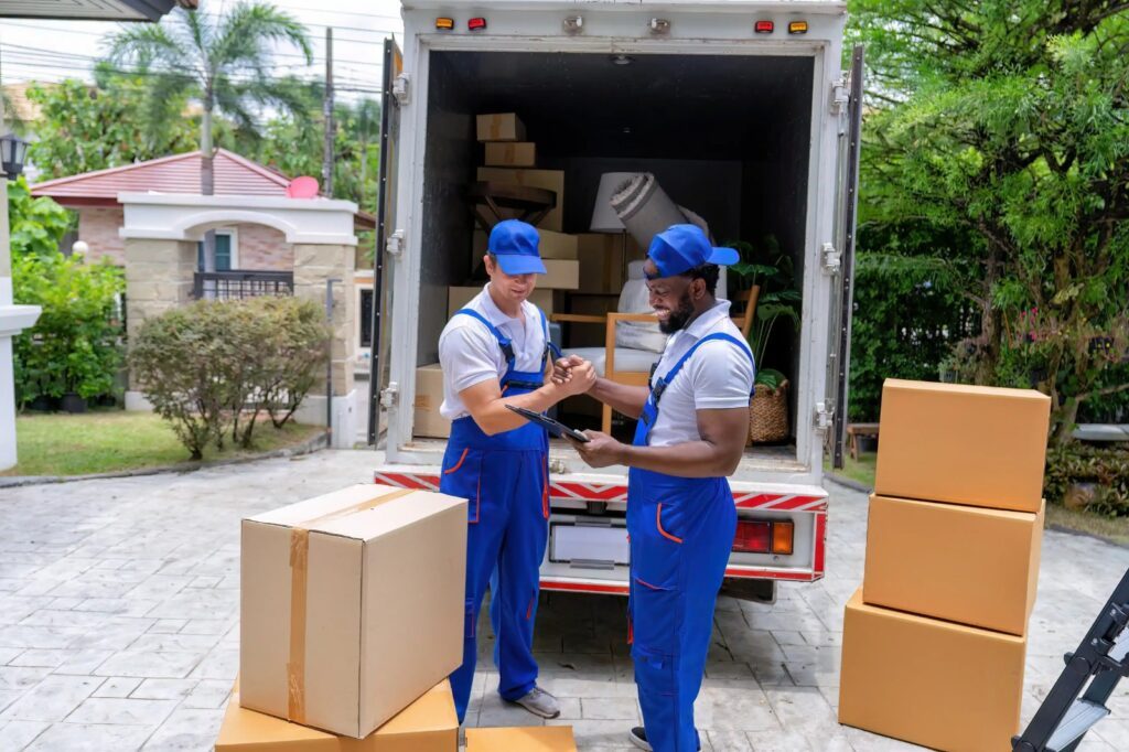 Our expert moving services in south miami heights fl crew loading boxes into moving truck.